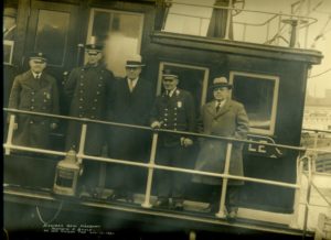 Captain John Williams, 2nd from right, aboard new Fireboat 'Matthew J. Boyle, November 17, 1931.