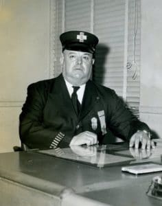 Fire Fighter - Inspector Gilbert W. Jones, in his office, circa 1963.
