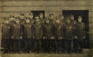 Hoseman Walter P. Nolan, 3rd from right, front row, at Drill School, 60 Bristol Street, South End, July, 1913.