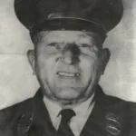 Photograph of Fire Captain David F. Watkins, Engine Company 39, upon his retirement after 55 years of service.